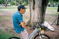 Man with pet birds enjoying the music